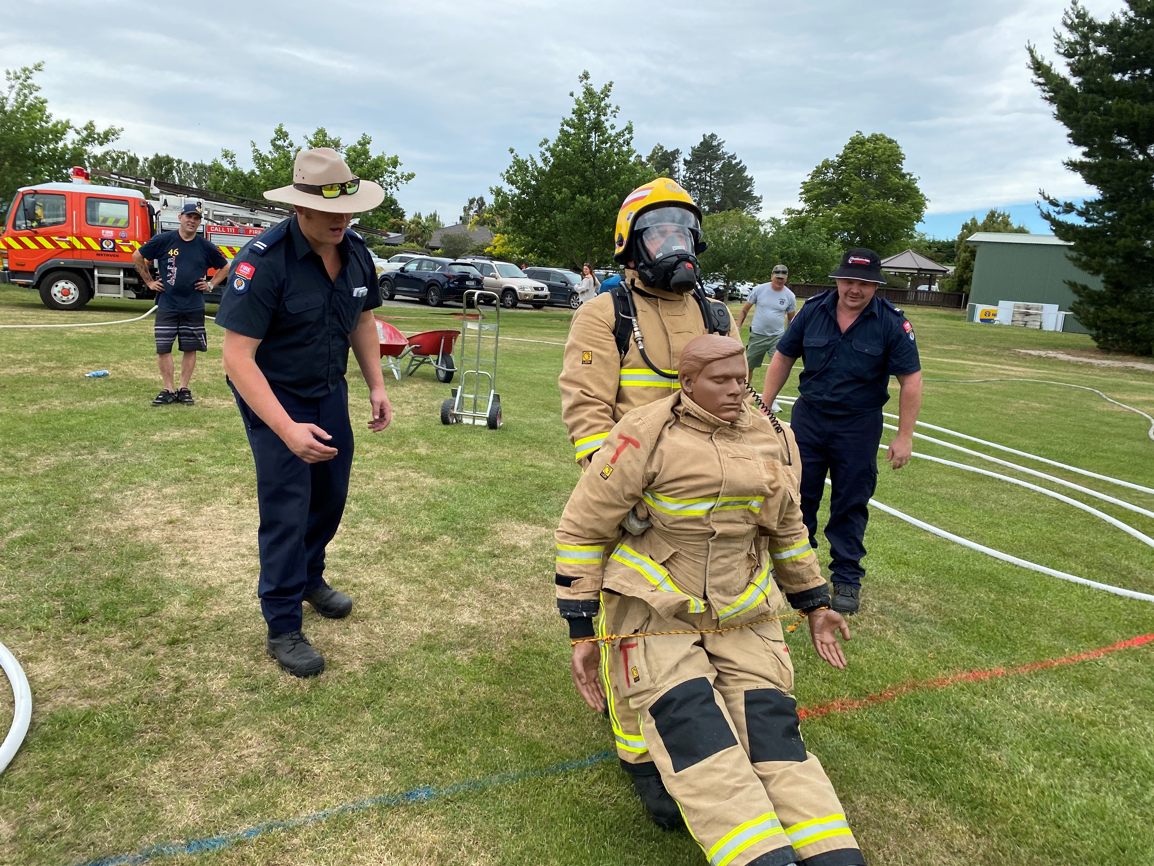 Firefighters taking part in a Mid Canterbury brigade challenge